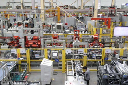 赶制订单忙生产 出入口机背后的制造热潮